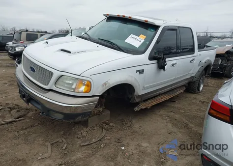 2002 Ford F-150 Lariat/Xlt z USA, uszkodzony, nr VIN 1FTRW08LX2KC44461